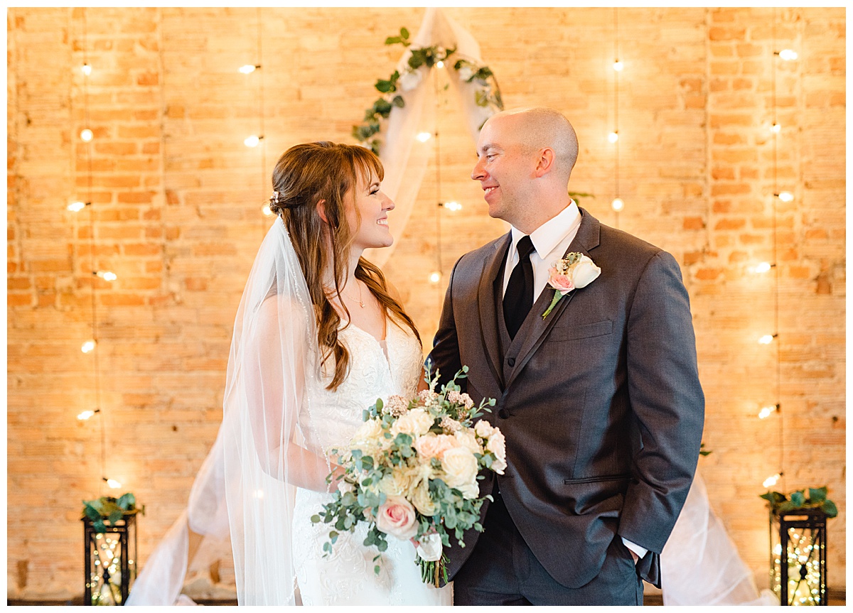 Smiling couple at capitol room wedding