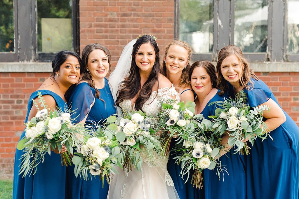 Bridesmaids with bright blue dresses