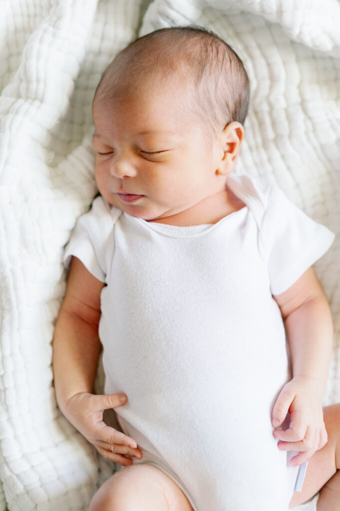 sleeping newborn to show what to wear for newborn photos