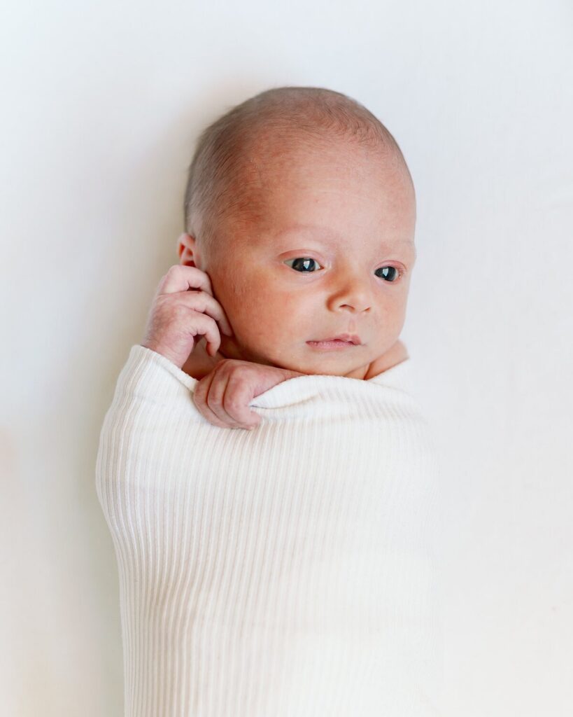Newborn baby during a newborn photography session in the Twin Cities, MN.