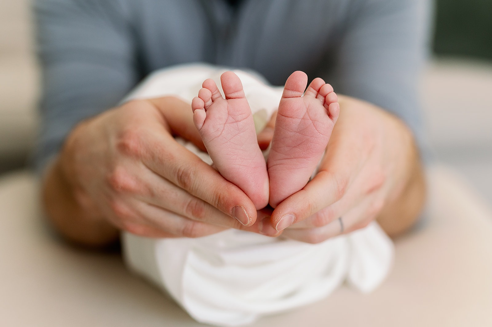 Babies feet posting for newborn photography in the Twin Cities.